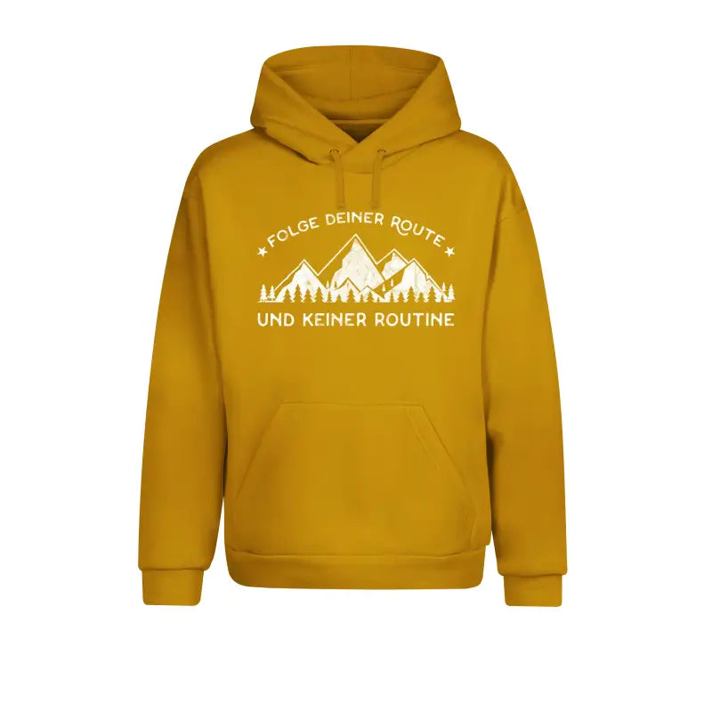 
                      
                        Folge deiner Route und keiner Routine Outdoor & Wandern Hoodie Unisex - XS / Mustard
                      
                    